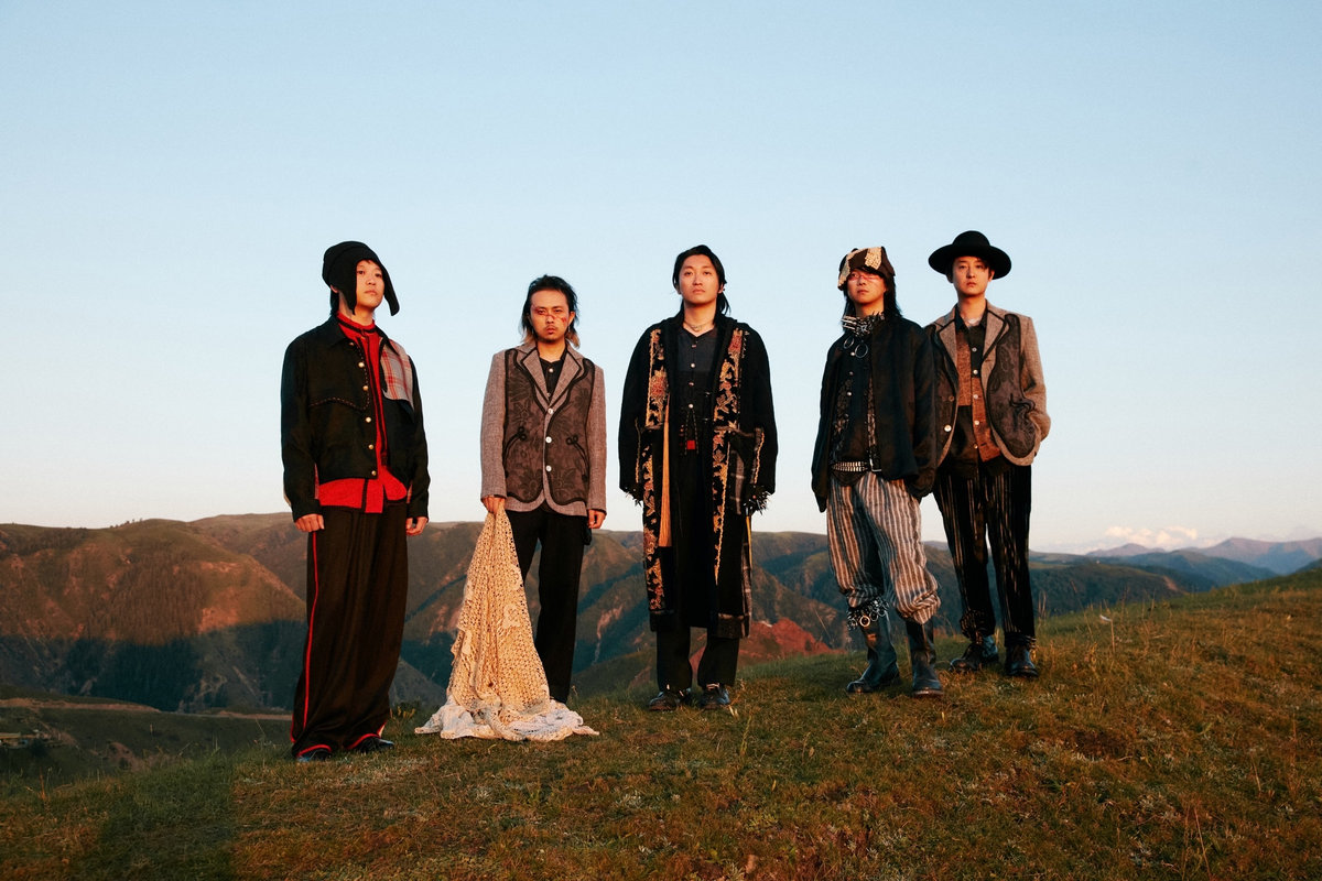 FAZI band portrait on a hillside